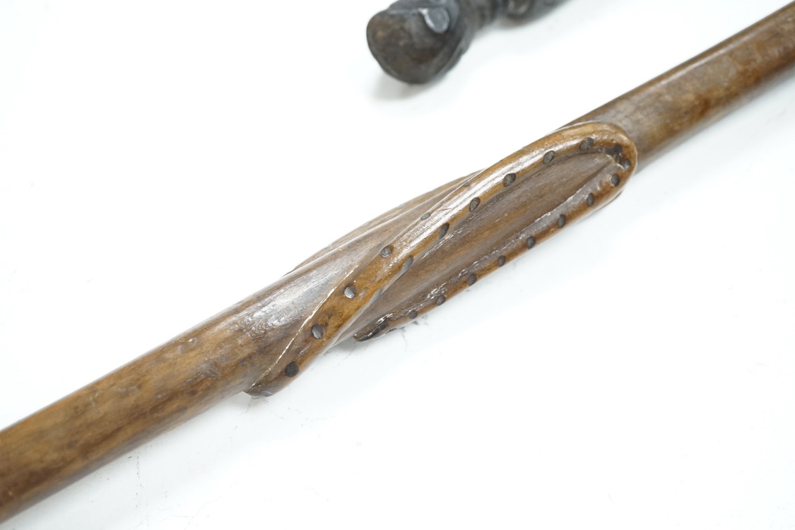 Tribal interest: Three carved hardwood African staffs, longest 148.5cm. Condition - good considering use and age